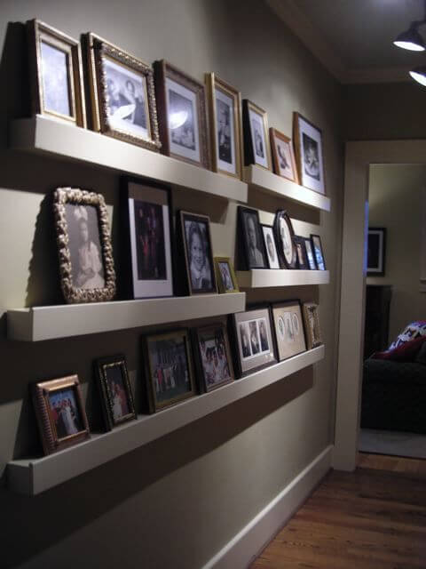 Display Your Family Photos in a Way That Gets Everyones Attention shelf in hall Display Your Family Photos in a Way That Gets Everyones Attention