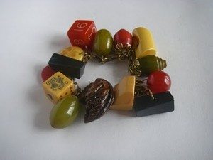Bakelite Jewelry: Bold & Beautiful but is it Real? plum charm bracelets 300x225 Bakelite Jewelry: Bold & Beautiful but is it Real?